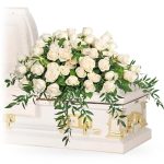 white roses casket spray