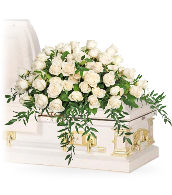 white roses casket spray